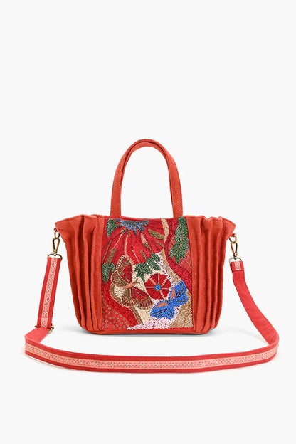 Artesanía única en bolso de hombro vegano para eventos especiales.